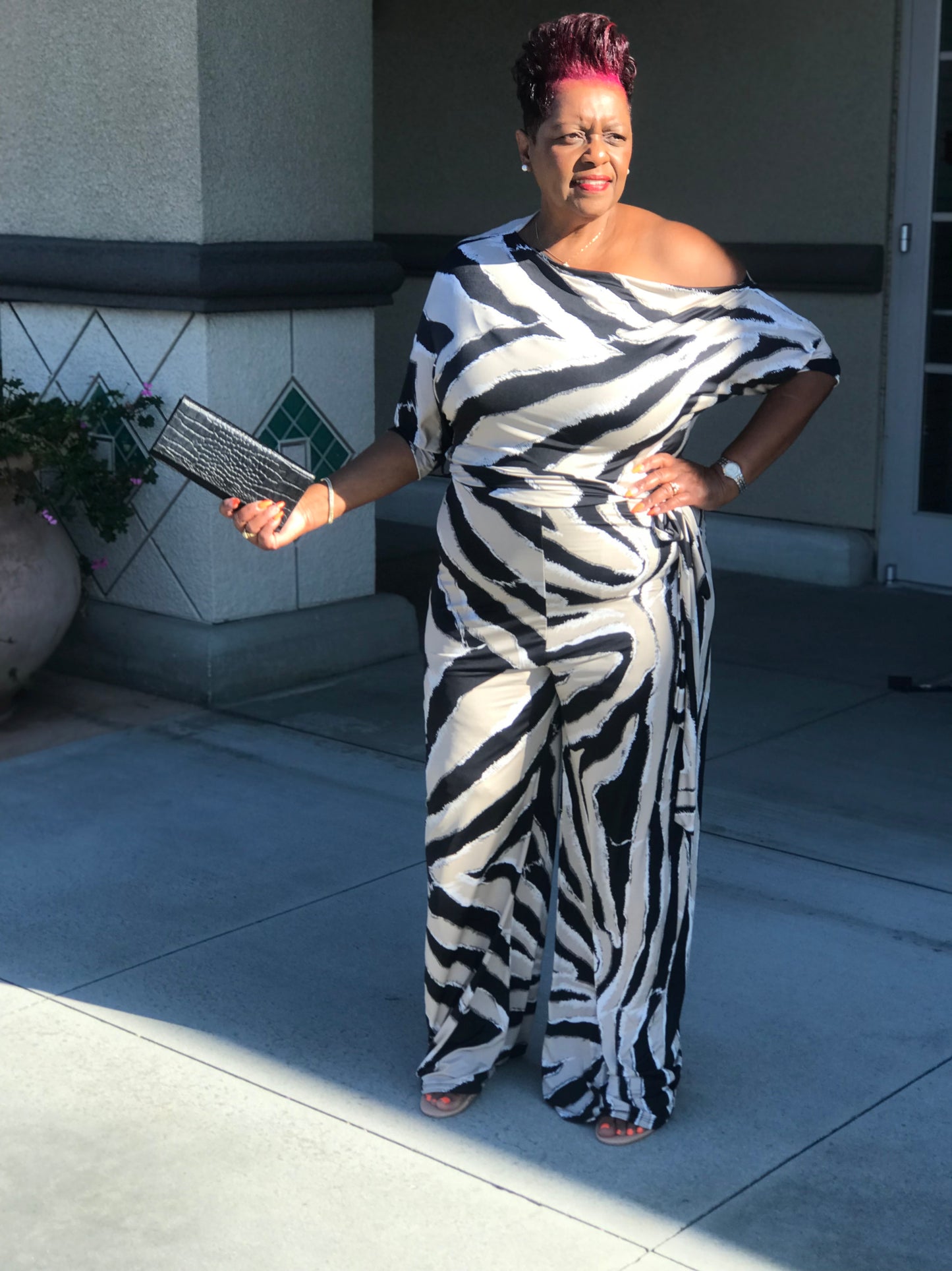 Logan Zebra Print Jumpsuit - Shirley Girl Boutique