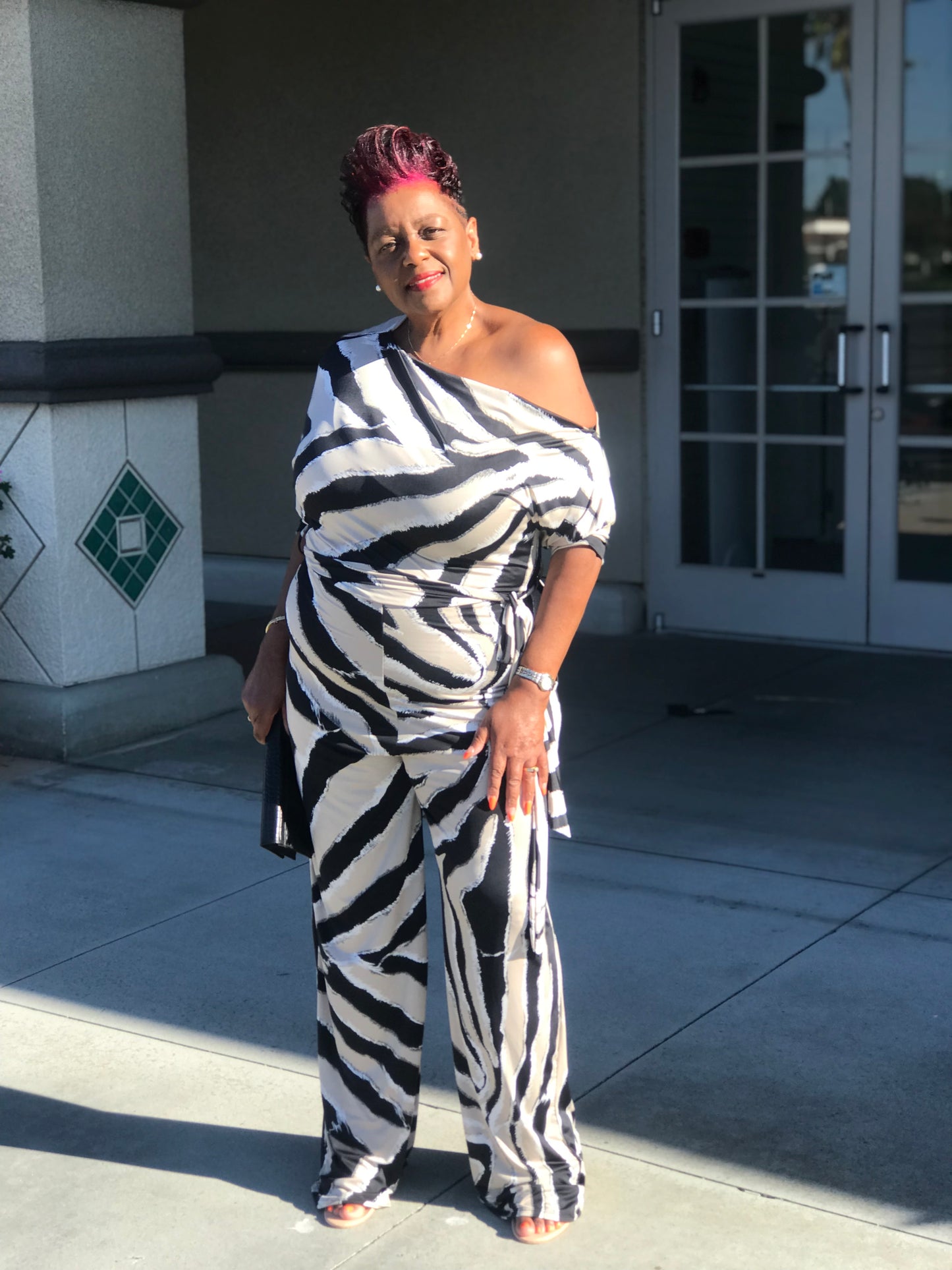 Logan Zebra Print Jumpsuit - Shirley Girl Boutique