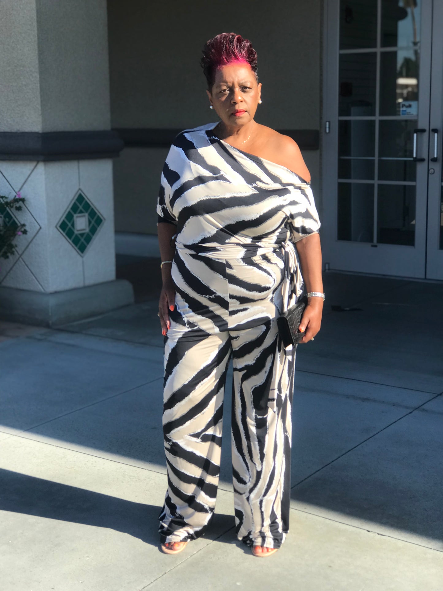 Logan Zebra Print Jumpsuit - Shirley Girl Boutique