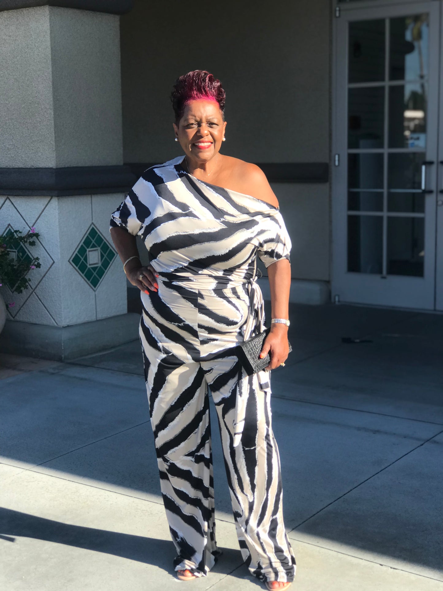 Logan Zebra Print Jumpsuit - Shirley Girl Boutique