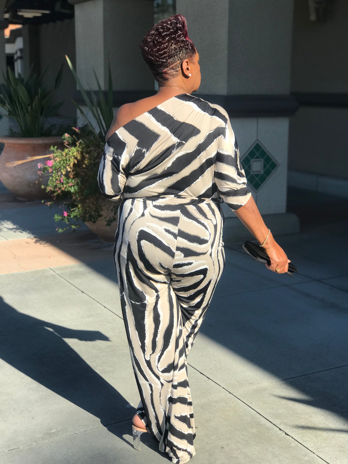 Logan Zebra Print Jumpsuit - Shirley Girl Boutique